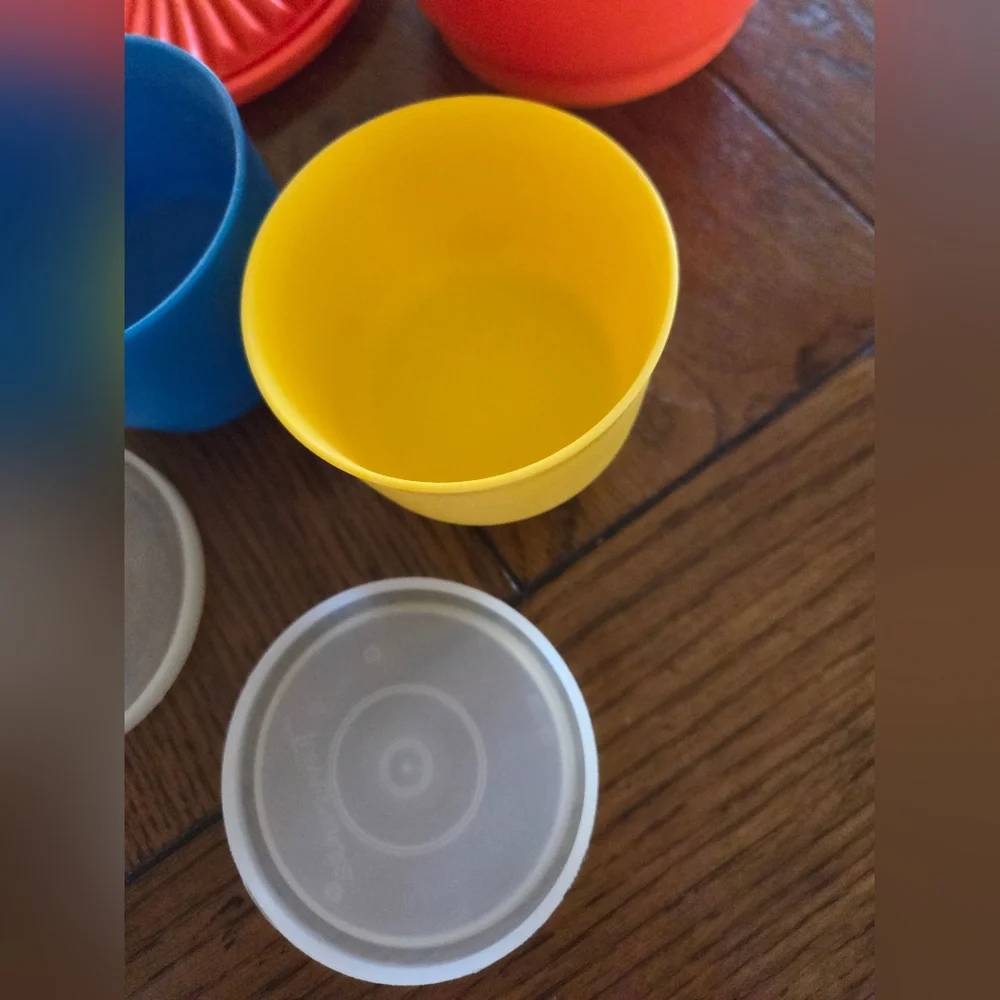 Colorful vintage Tupperware.  2 snack cups One 20 oz storage bowl.